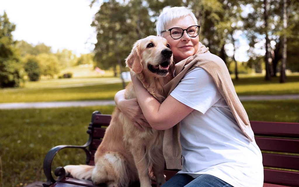 senior lady with pet dog