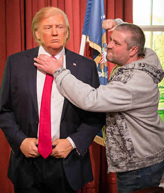 Trump wax statue being “attacked”